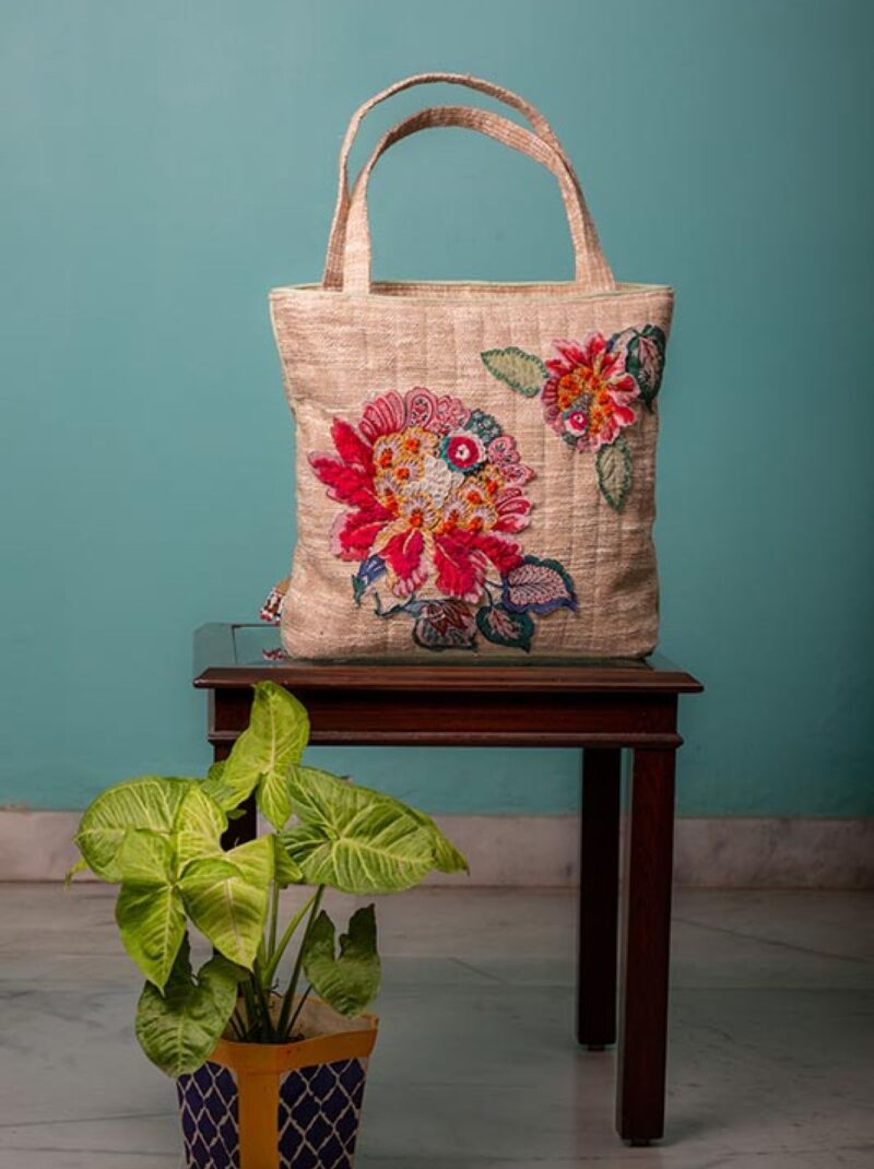 Ethnic floral tasseed bag