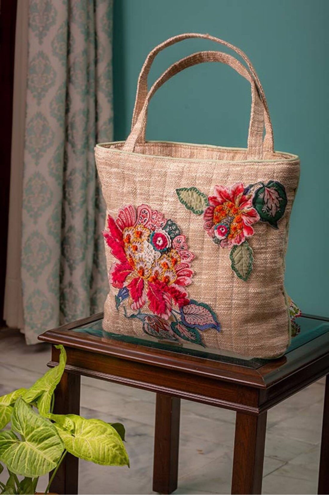Ethnic floral tasseed bag