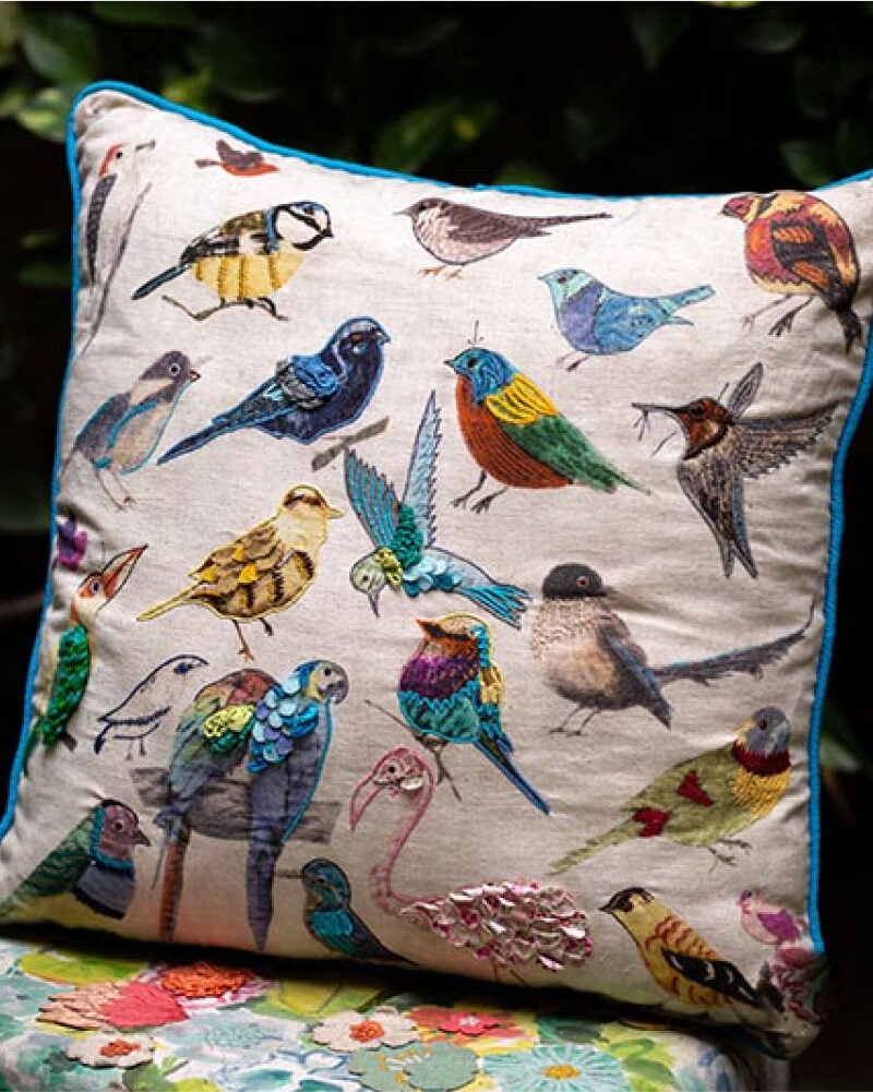 Buy comfortable cushions to spice up your living room or bedroom now! Available at Mysa Spaces the stunning cotton fabric Multi bird paradise sofa cushion .